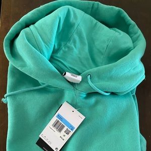 Light green Nike hoodie/sweatshirt women’s size Medium.